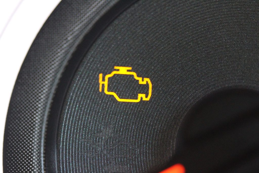 Check engine light lit on a car dashboard