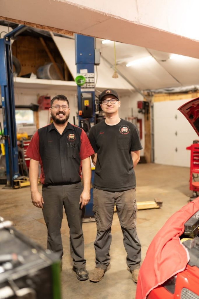 Two technicians at TinJToo Auto Repair